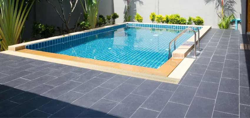 These hues present an elegant, lagoon-inspired ambiance and instill a sense of drama. They can also impart an illusion of enhanced depth in your pool.