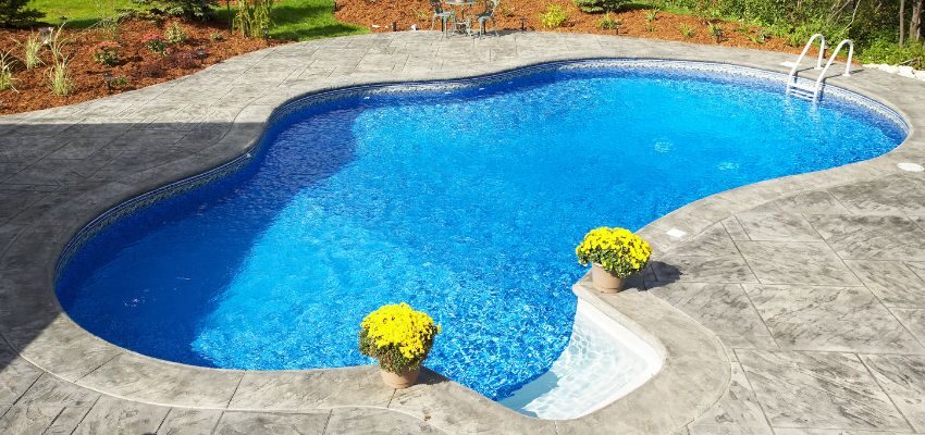 An irregular-shaped swimming pool.