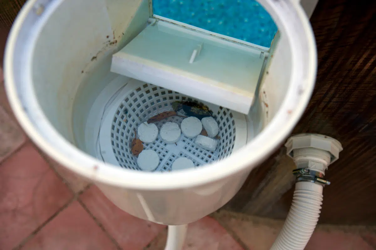 A bunch of chlorine tablets in a skimmer basket.
