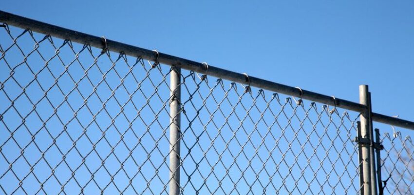 A chain-link fence is the cheapest fencing option you can find for pretty much any part of the house.