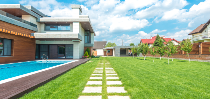Replace natural grass with synthetic turf to create a lush and vibrant poolside space.