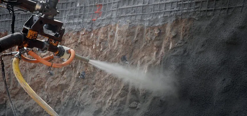 Shotcrete can be a wet-mix or dry-mix blend of cement, water, and sand thoroughly mixed in the cement truck's barrel before it's shot out of a hose at high velocity during application.