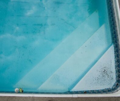 A pool that has sediment from the bottom of the pool.