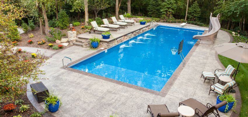 Fiberglass pools have smooth surfaces. They generally need less maintenance than concrete counterparts.
