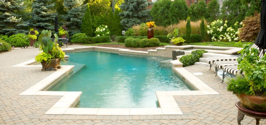The pool should seamlessly blend with your home’s architectural style.