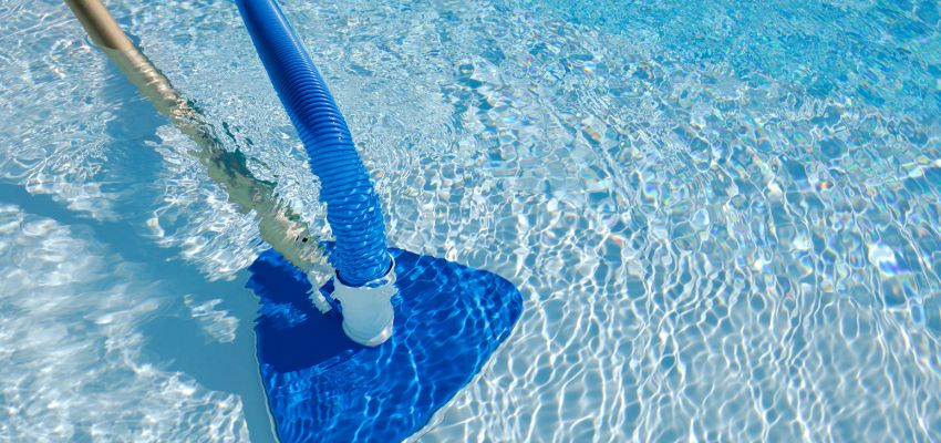 Brushing the pool walls and floor removes algae and other forms of buildup. Use a pool brush to reach every corner and crevice.