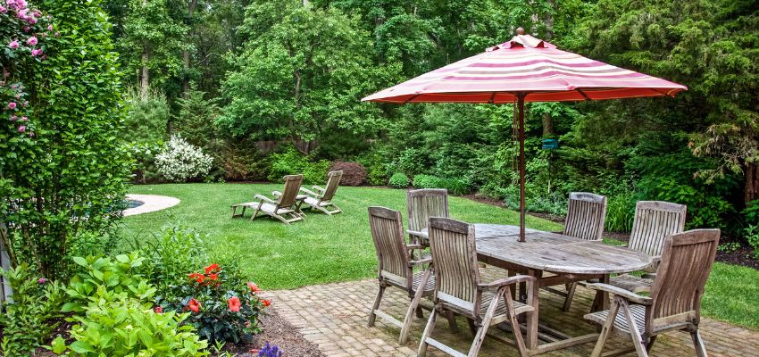 A well-designed patio can turn your outdoors into a functional and inviting oasis. Include comfortable furniture, adequate lighting, shade solutions, and lush greenery.