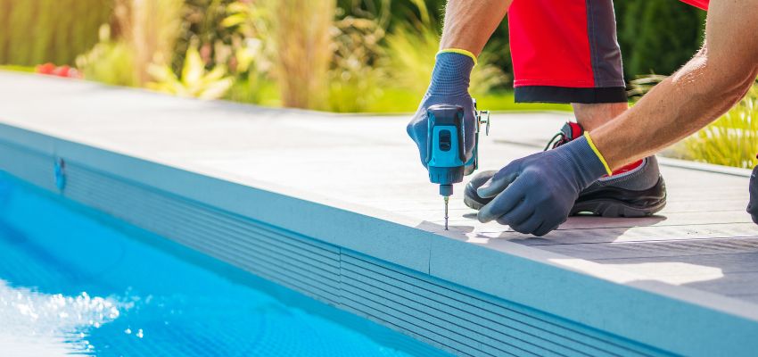 Workers apply the finish thoroughly over the shotcrete, creating a smooth, good-looking surface. The layer enhances the pool's visual appeal and effectively seals it to prevent water leakage, ensuring its structural integrity over time.