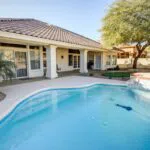 The pool needs a finish renewal as it is showing cracks and discoloration.