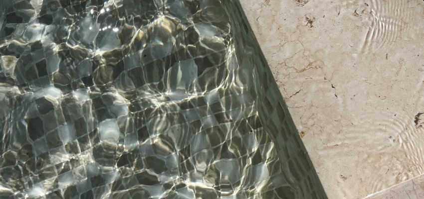 Glass tile looks great and lasts long, but it is more expensive than other pool finish renewal options.